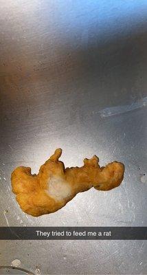 RAT SHAPED CHICKEN PIECE ??? Inside doesnt look like chicken either.