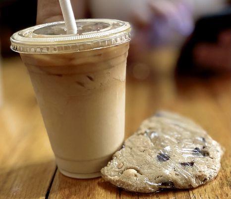 Iced Americano and 1/2 of a peanut butter chocolate chip cookie.  Sorry, 1/2 is already eaten.