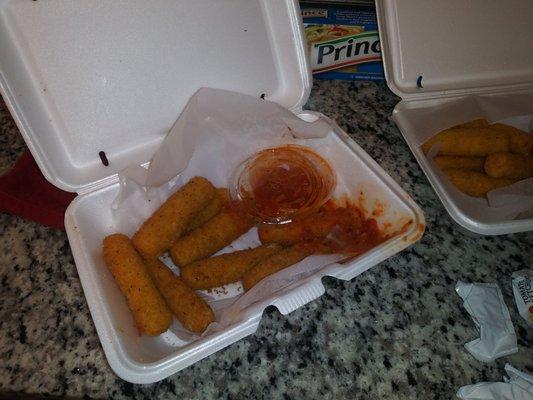 Mozz sticks with marinara spilled all over the inside.