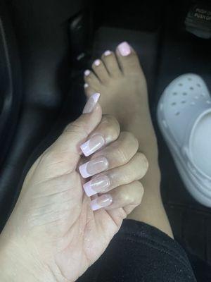 It's giving Barbie vibes. Pink French tip and pink pedicure.