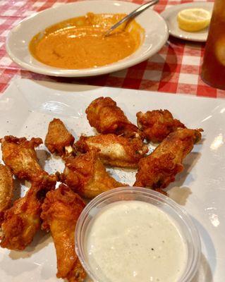 Tomato basil soup and Buffalo wings, which had a tasty, crispy crust. They comped more wings, as they were on the small side. Nice.