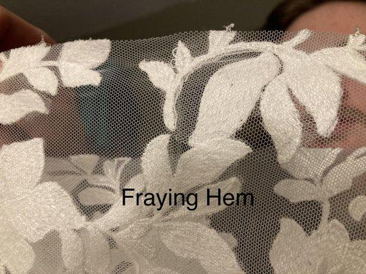 Chopped hem right through appliqué and was frayed