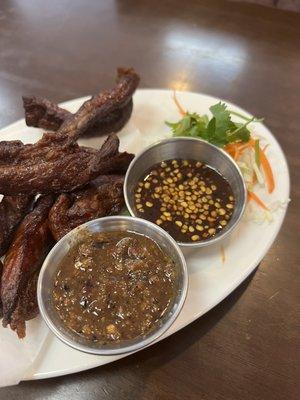 Neua Daet Diao (Beef Jerky). Tamarind Sauce and Thai Anchovy Dipping Sauce.