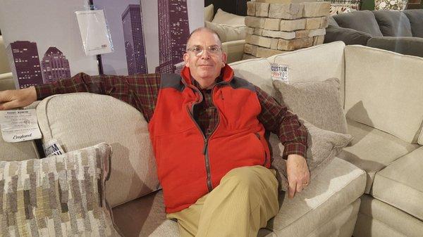 Matt, our friendly sales associate, enjoying the floor model of the couch my wife and I just purchased.