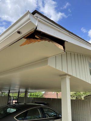 Neighbor witnessed the machine used to haul old concrete hit my carport and damage.