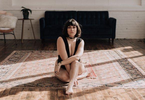 Cheyenne Gil in her natural light boudoir studio.