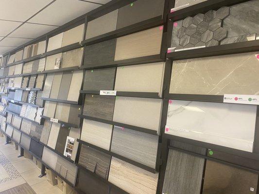 All of the tiles on this wall are between 40% - 80% off of retail prices.  Very high quality!