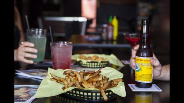 Jolly rancher vodka drinks, fries, tots, and Pacifico..)