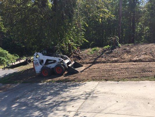 Skid steer for hire.