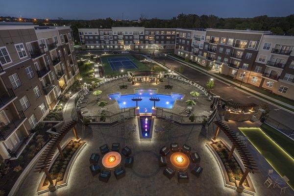 Social Deck including two fire pits, heated salt-water pool, tennis court, putting green, bocce ball court and resident grills.