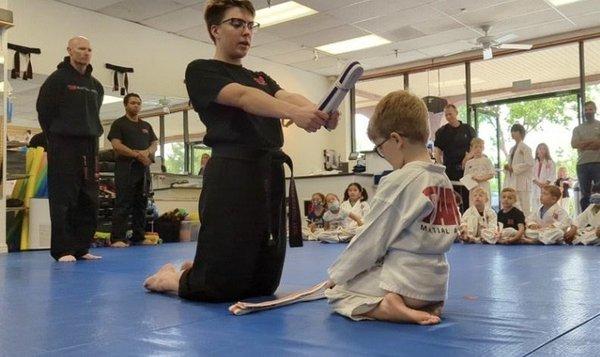 June 2022 - getting his purple belt, confident and proud.