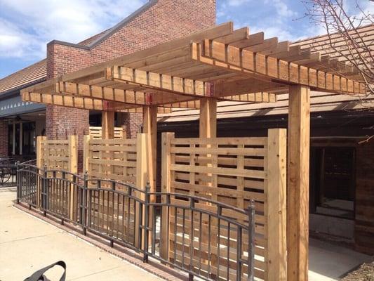 Outdoor patio red door grill.