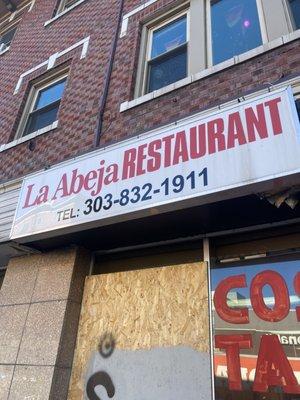 Outside the restaurant. It is on Colfax so things happen with windows...however don't judge a book by its cover.