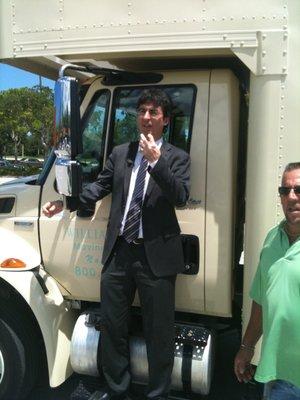 John Oliver came down to film a segment with us after we took place in the foreclosure on a particular bank branch in Naples.