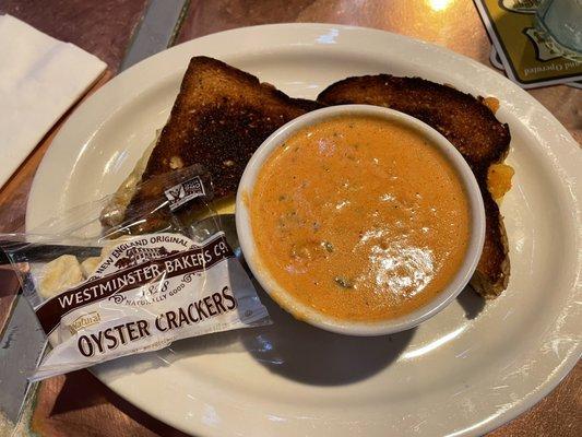 Smoked Gouda and pepper Jack grilled cheese with house made tomato bisque for $11.99.