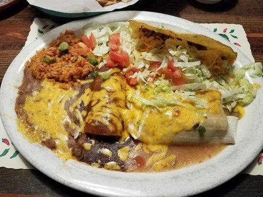 Monterey combination platter with one beef enchilada, one beef taco, and a burrito.