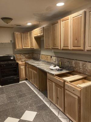 Installing cabinets and countertops