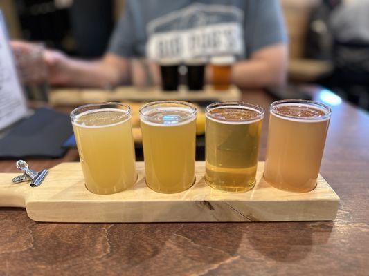 Beer flight - Hazy IPA, Pale Ale, Blonde Ale, and Blackberry Wheat