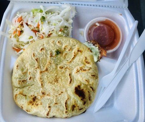 Pupusa queso con loroco, side curtido and salsa.