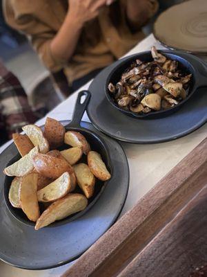 Side of Potato Wedges and Guajillo garlic sautéed mushrooms ($10)