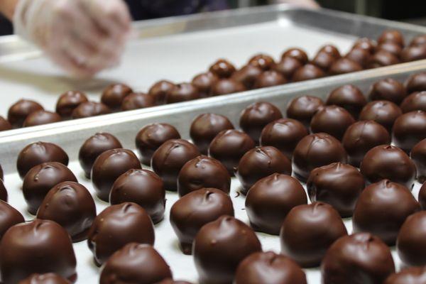 Hand dipping Chocolate Covered Cherries