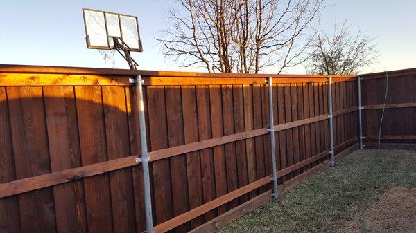 Board-On-Board Grade 1 Cedar with Galvanized Steel Posts and Steel Shanks.  Note the kickboard (treated spruce/pine).