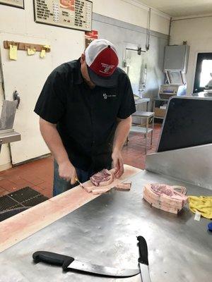 Ribeyes being prepared