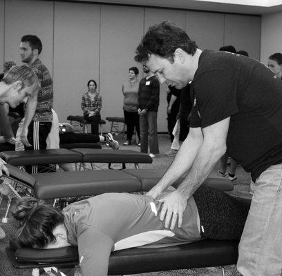 Dr. Port leads international seminars, teaching other chiropractors to adjust with peace and ease.