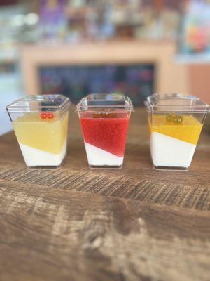 Pineapple, raspberry, and mango panna cotta desserts