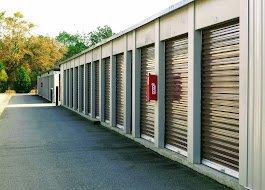 A side angle of the exterior Live Oak Storage brown storage units