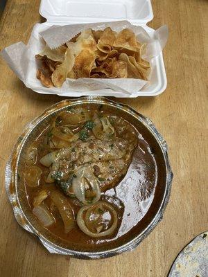 Pork Chops with Carmelized onions and homemade potato chips  Chuletas de Cerdo Encebolladas