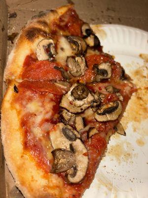 Personal pepperoni and mushroom pizza.