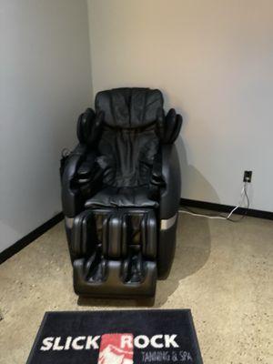 Traditional massage chair has a variety of settings. Great for while you're waiting for another service.