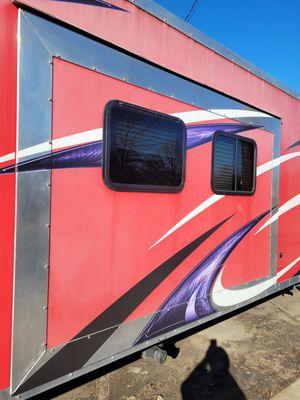 A faded RV we gel coated to bring back the shine