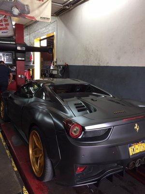 Ferrari getting wheel alignment