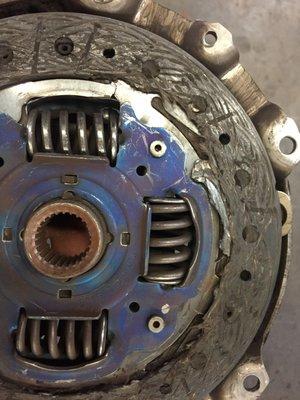 Worn clutch disc.