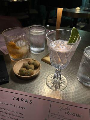 Rose Colored Crystals Cocktail, Classic Old Fashioned, & Fried Olives to start.