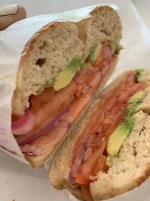 Toasted bagel with Smoked salmon avocado and tomatoes. The absolute best