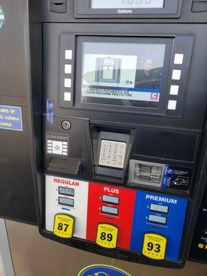 Bill Lewis of Vero Beach filling up for $2.55 a gallon at Busy Bee in Lake City, Florida.