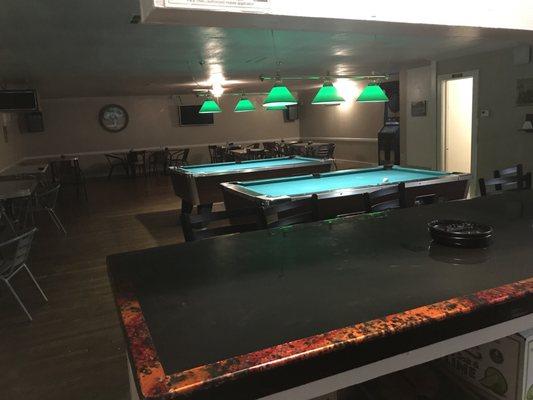 2 pool tables and jukebox