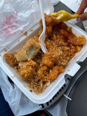 Sesame chicken, fried rice Eggroll Crab Rangoon