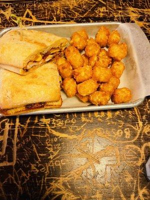 Chicken sandwich with tater tots