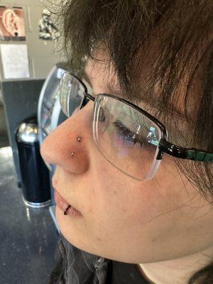 A set of high nostril piercings done at T Doggs