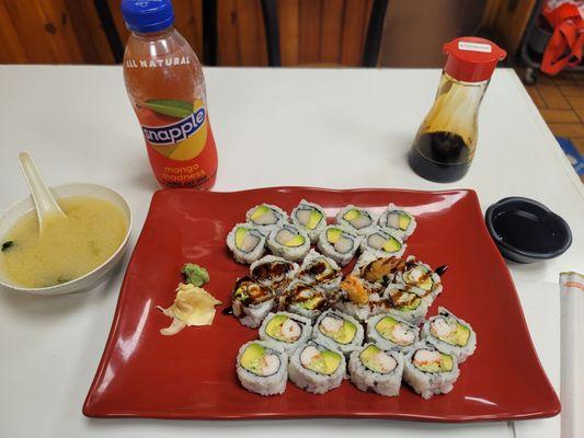 3 roll lunch special. California Roll, Shrimp Tempura and White Tuna Avocado rolls along with miso soup and a snapple to the side.