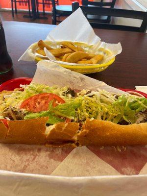 Steak and cheese with fries