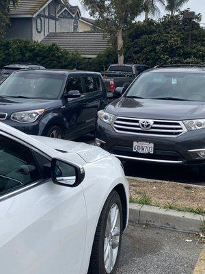 You can see the pick up in the very back parked next to my car.