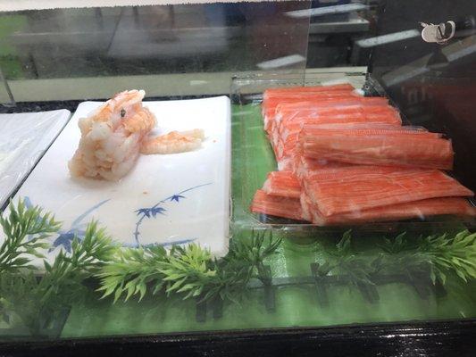 Fly on shrimp in sushi cooler because they sloppily left door open!