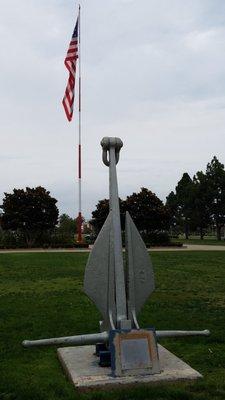 anchor and the US flag in the background