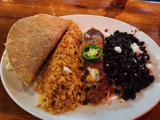 Chicken taco, rice, beef enchilada, black beans.