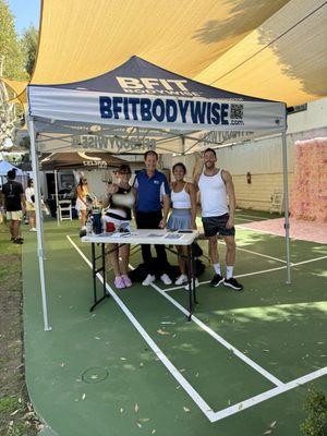 Ken, here is a photo of you with some BFIT fans at the recent Charity Tournament at Newport Beach Tennis Club.